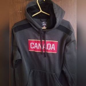Nike medium therma-fit grey canada hoodie.